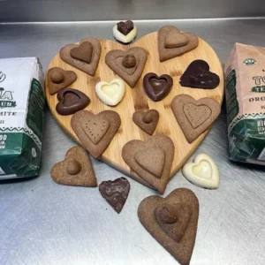 Image of a selection of natural grain treats shaped like love hearts