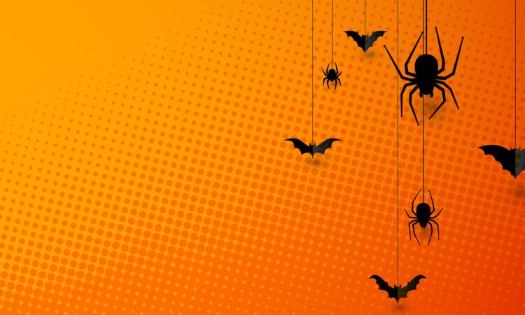 A orange pop art inspired background with black spiders and bats - it is halloween themed